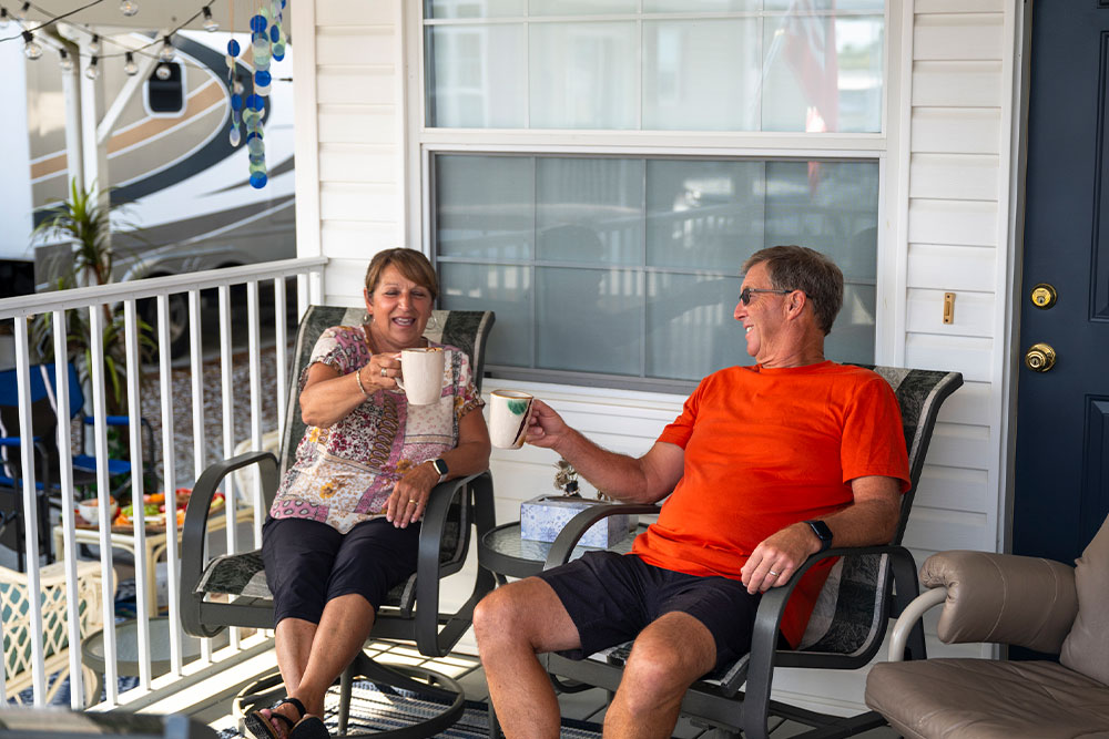 a man and a woman sitting on a chair